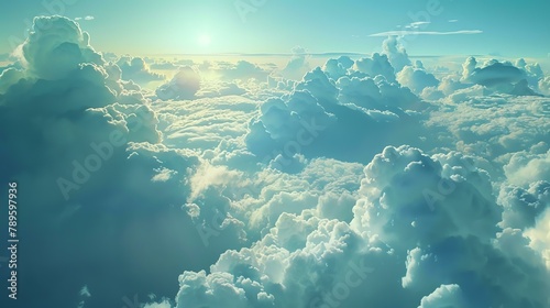 Amazing view of the clouds from above. The sun is shining brightly and the clouds are lit up with a golden hue.