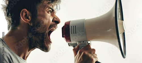 young man shouting protesting speaking loudly megaphone microphone white background