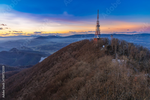 The top of the Boč mountain after the sunset on a beautiful winter afternoon, Slovenia