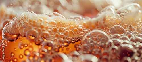 A glass containing a carbonated beverage with bubbles, providing a close-up view of the effervescence