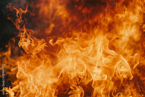 An HD photograph of a blazing fire icon, capturing the intensity and brilliance of the flames as they engulf the scene, casting a warm and fiery glow on a neutral background.