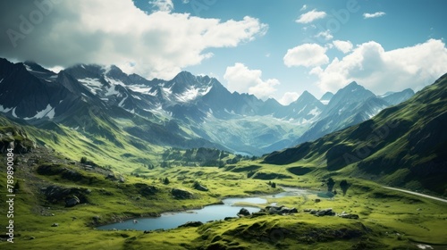 Landscape of rugged mountain peaks piercing the clouds, with lush green valleys