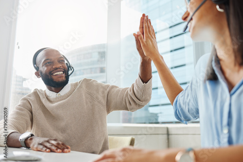 Team, success or happy man with high five in call center winning telemarketing or telecom bonus. Coworking, proud winner or excited virtual assistant with victory, goal or sales achievement in office