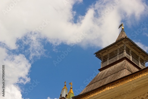 The top and roof of the watchtower in Rostov the Great against the sky.