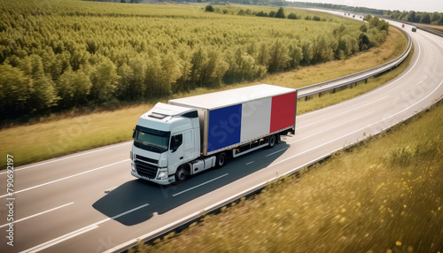 An France-flagged truck hauls cargo along the highway, embodying the essence of logistics and transportation in the France