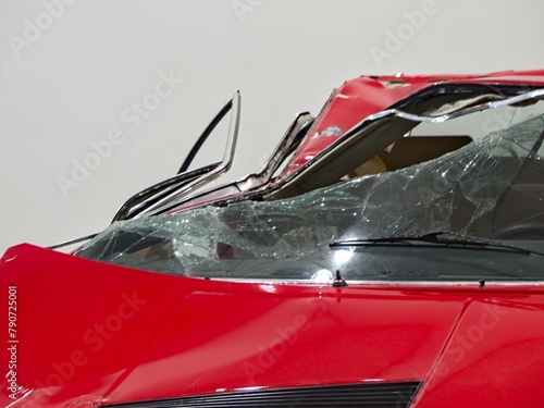 Red car after a road accident