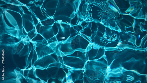 Animated transparent clean blue swimming pool water surface with waves and sunlight glitters. Water background light reflection, pool bottom, moving liquid plastic smooth. 8k wallpaper 4k screensaver.