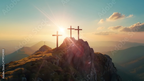Silhouette three Cross or Crucifixion of Jesus Christian on top of mountain with sunlight and clouds sky. Christianity religion concept.