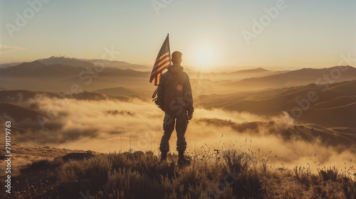 Patriotic soldier silhouette with american flag at sunrise