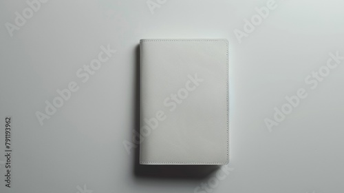 Minimalist white blank mockup of a passport holder with embossed detail .