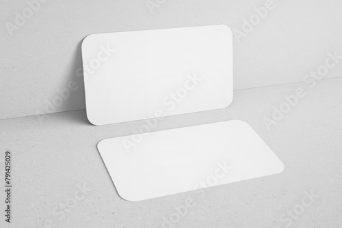 blank minimal clean 90x50mm us size horizontal brand identity business name card with round corner leaning to wall realistic mockup design template 3d render illustration