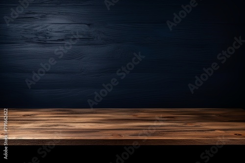 Abstract background with a dark navy blue wall and wooden table top for product presentation, wood floor, minimal concept, low key studio shot