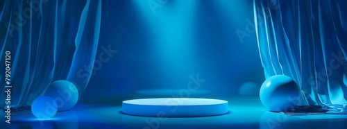 Artistic blue spheres and podium on minimalist blue background illuminated by soft, dramatic lighting