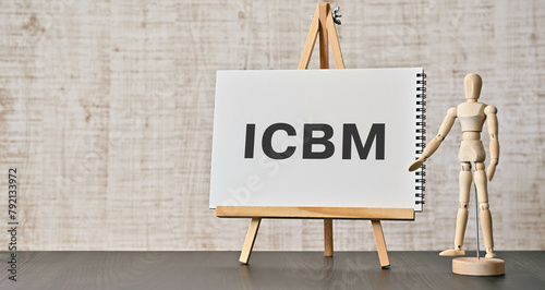 There is notebook with the word ICBM. It is an abbreviation for intercontinental ballistic missile as eye-catching image.