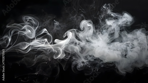 Swirling gray smoke, abstract fog, or white haze moves beautifully on a black background, resembling cloudiness or smog.