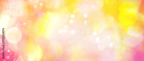 Strahlender abstrakter Hintergrund mit hellen, funkelnden Lichtern in Gelb, Orange und Rosa für positive, freudige, energetisierende und lebensbejahende Inhalte