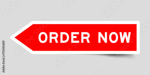 Red color arrow shape sticker label with word order now on gray background