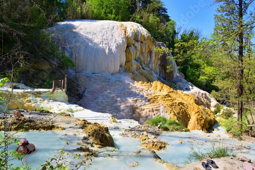 view of the sulphurous water spa Bagni San Filippo characterized by the presence of limestone deposits in Siena, Tuscany, Italy