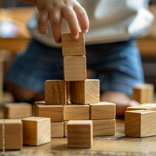Little hand child playing with blocks