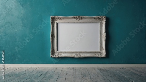 Empty frame leans on an aegean teal painted wall 