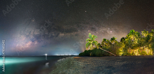 Milky way over beach on tropical island in Maldives
