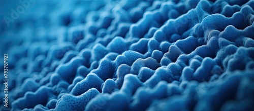Blue spongy texture with numerous tiny pores