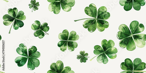 A pattern of green four-leaf clovers scattered across a light background, symbolizing luck and Saint Patrick's Day.