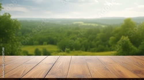 Wood table mockup with summer rain over green landscape. Empty copy space for product presentation.