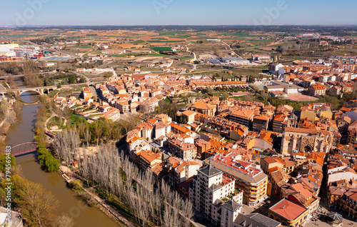 Bird's eye view of Spanish city Aranda de Duero with view of Duero River.
