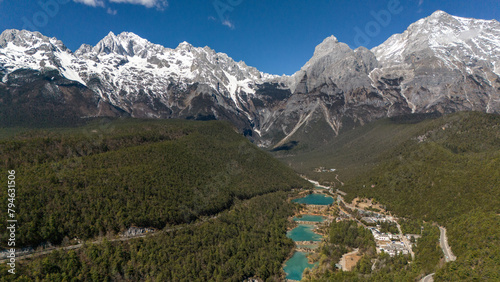 Aerial view of Jade Dragon Snow Mountain (or MtYulong) seen from blue moon valley scenic area in Yulong Naxi Autonomous County, Lijiang, in Yunnan province, China.