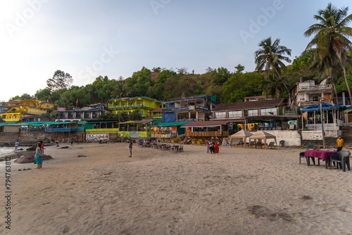Beach restaurant shacks and sunbeds on Arambol beach in north Goa, India 
