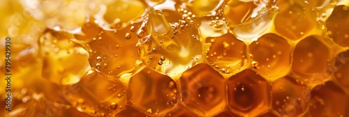 Dive into the amber depths of liquid honey, its warm tones inviting you to bask in the sweetness of nature's nectar