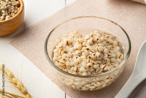 Job's tears in syrup,Boiled millet with sugar in glass bowl.