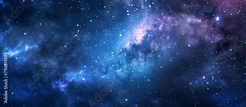 Captivating image of a swirling galaxy in stunning shades of blue and purple, adorned with twinkling stars against a deep black background