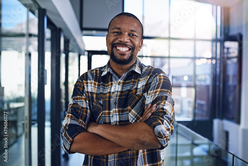Office, crossed arms and portrait of business black man with company pride, confidence and smile. Creative startup, professional and happy person for career, work opportunity and job in workplace