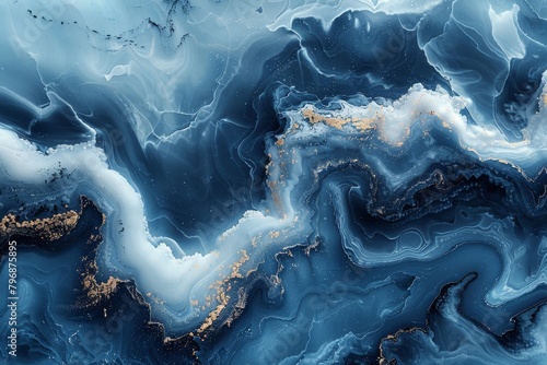 Elevating the beauty of fluid dynamics, this image showcases the ethereal interplay of blue hues and golden accents