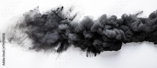 Black smoke cloud on white backdrop