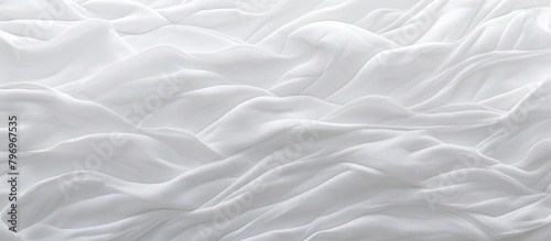 White bed with crisp sheet close-up