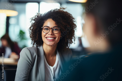 young woman with captivating, radiant features, representing African heritage, aged 32, confidently leading a team meeting in a modern office space