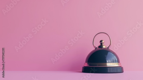 hotel desk bell on pink background