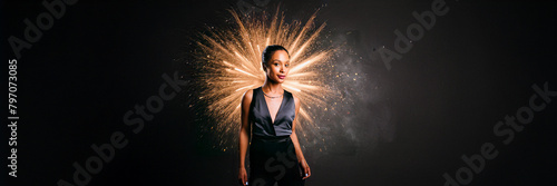 woman silhouette with firework explosion behind