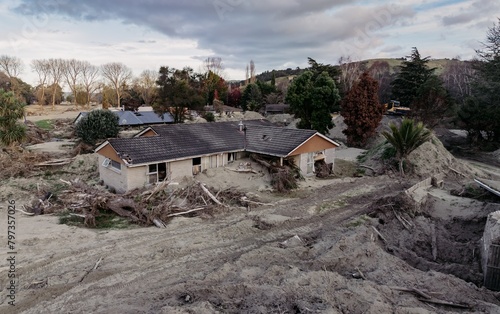 Silt and housing estate buried and damaged in the Cyclone Gabrielle natural disaster. Eskdale, Napier, Hawkes Bay, New Zealand Bay. February 2023