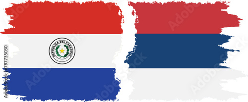Serbia and Paraguay grunge flags connection vector