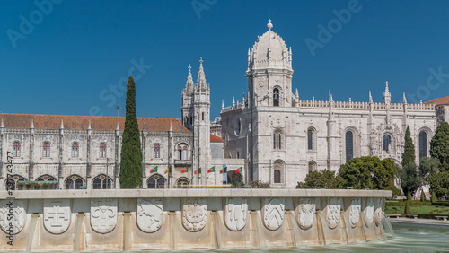 Jeronimos monastery and fountain seen from the Imperio garden timelapse in Lisbon, Portugal.