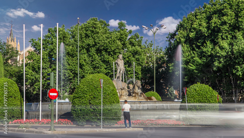 Fountain of Neptune timelapse hyperlapse at the center of the Canovas del Castillo square in Madrid, Spain.