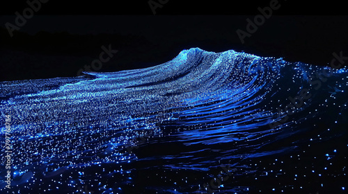 Bioluminescent glowing beach and sea at night. Illumination of plankton at Maldives. Romantic and beautiful landscape. Tropical paradise background. Travel and vacation concept