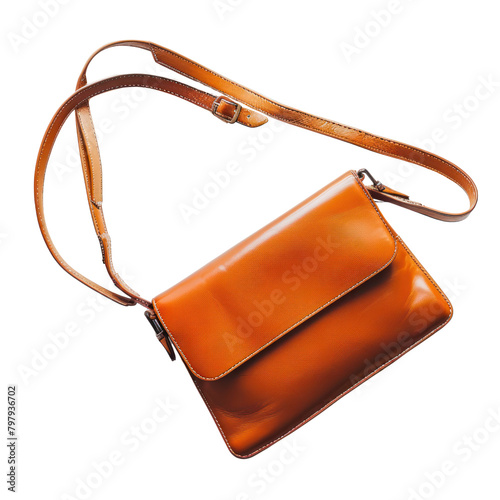 Purse with a shoulder strap laying flat isolate on transparent png.