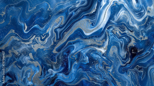 An ultra HD image of a deep sapphire blue marble texture with swirling patterns of silver and pale blue, resembling the turbulent seas from above.