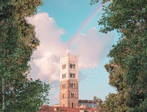 tower of lucca with rainbow, italy