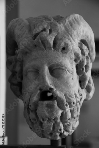 head of satyr statue